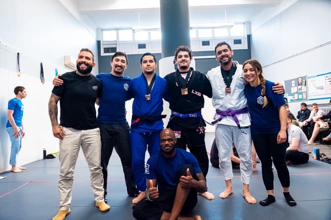 Belt-ceremony group photo at GrappleZone